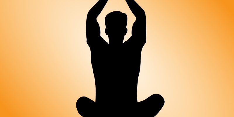 Male yoga meditation pose symbol with yellow background – Vector
