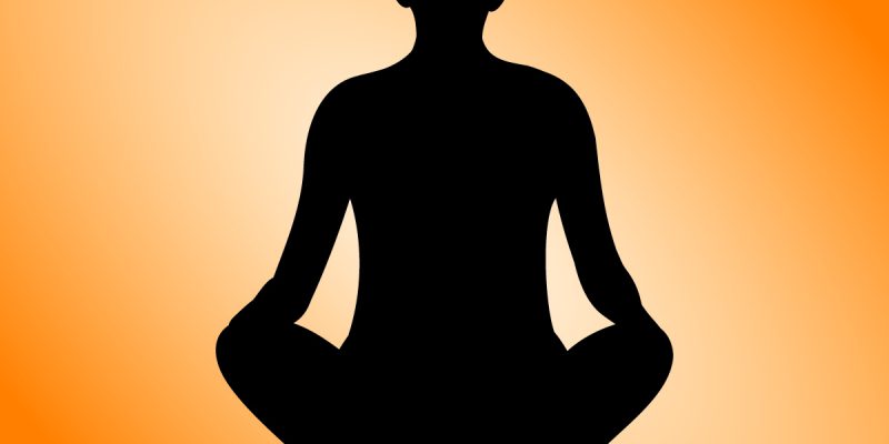 Yoga meditation pose with yellow background vector image