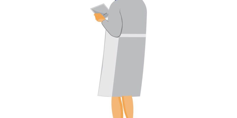 Female doctor using digital tablet – free vector