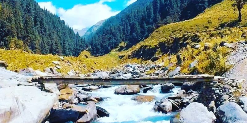 Beautiful natural background, summer landscape with river, forest, mountain, sun and blue skies.