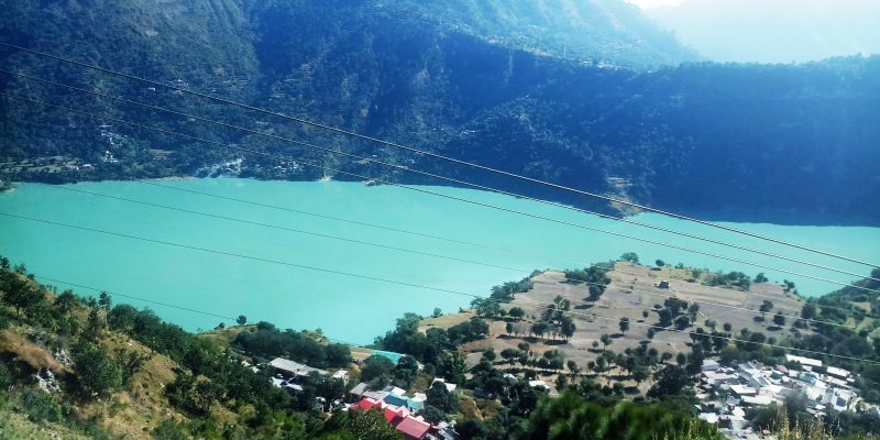 Beautiful village in hilly area with lake – Free Photo