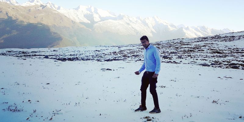 Tourist looking at beautiful ice landscape on mountain  – free photo