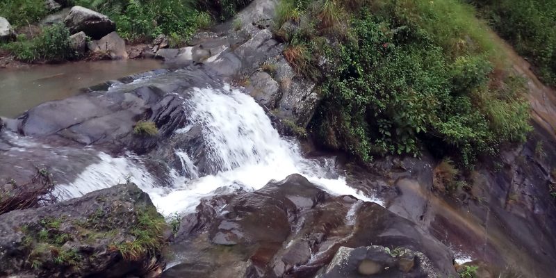 Waterfall in mountain area  – free photo